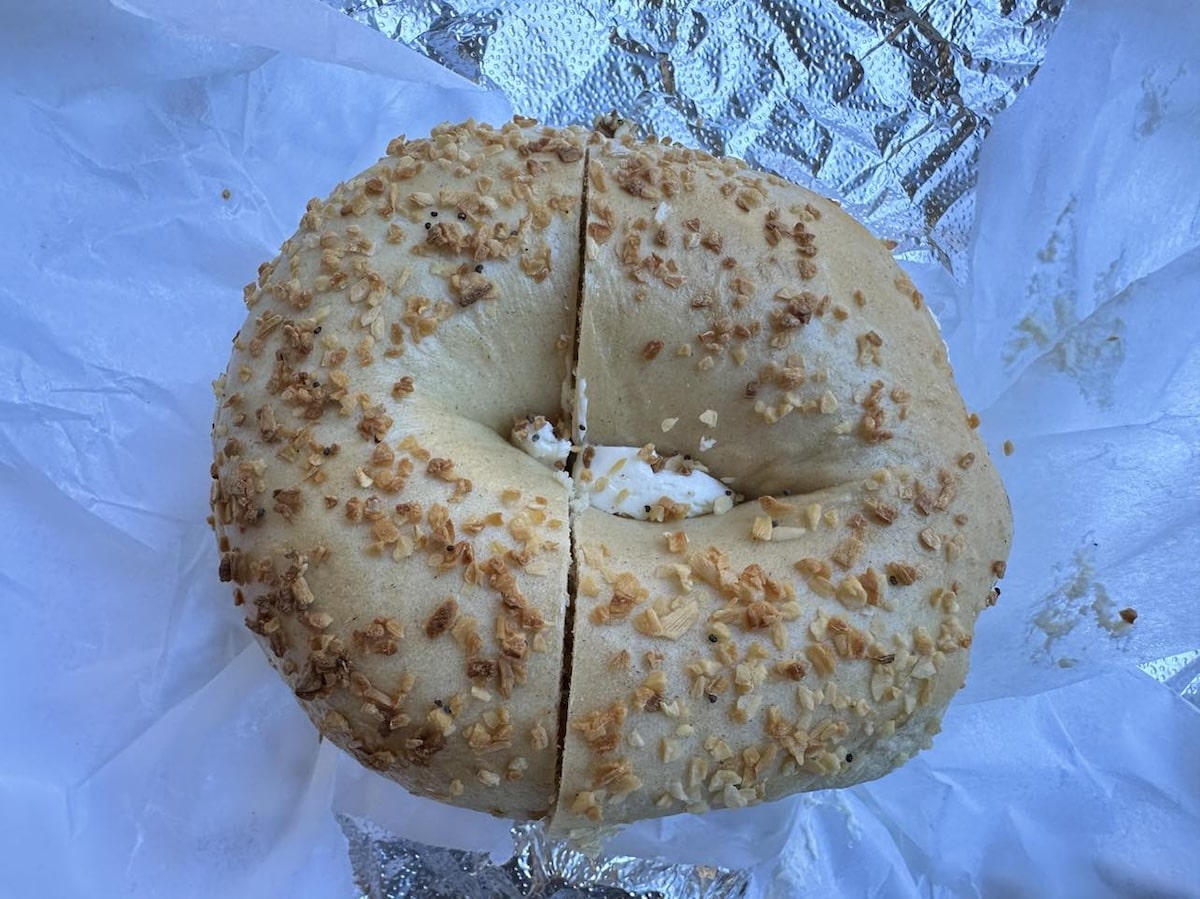 Onion bagel with cream cheese from Bagel Talk