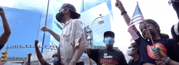 Group Burns American Flag at Columbus Circle