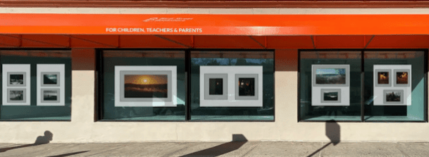 Summer Art Exhibition in Windows of Former Bank Street Bookstore