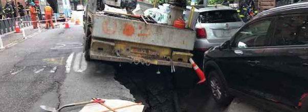 Truck Lands in Sinkhole on 89th and Columbus