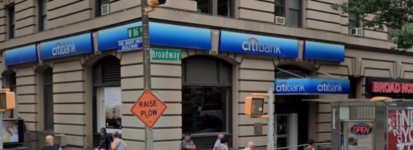 Suspect Steals $10,000 from Woman at Bank
