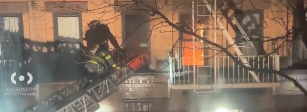 Firefighters Battle Flames from Second Floor Apartment